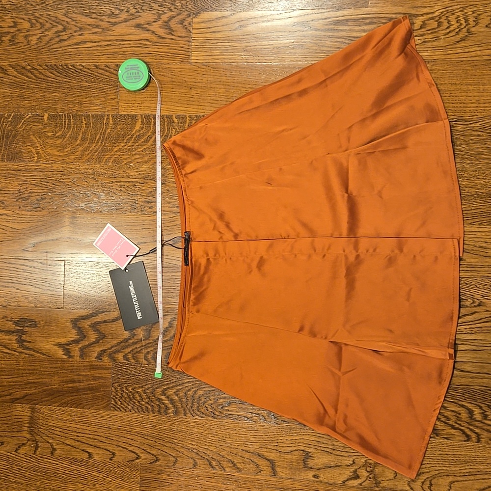 Rust orange button-up satin sheen skirt